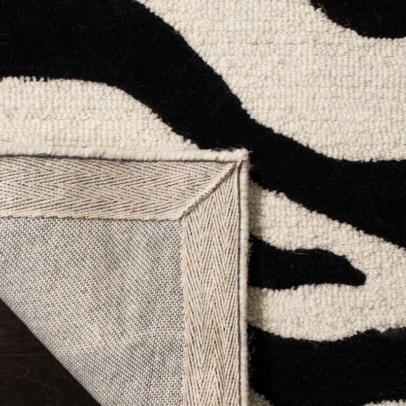 SAFAVIEH Handmade Cambridge Rikey Animal Print Wool Rug
