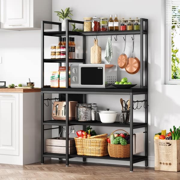 https://ak1.ostkcdn.com/images/products/is/images/direct/5bba27c29fc8280d96f8a555c5b3dd02e6be065a/Kitchen-Bakers-Rack-with-Storage%2C-43-inch-Microwave-Stand-5-Tier-Kitchen-Utility-Storage-Shelf.jpg?impolicy=medium