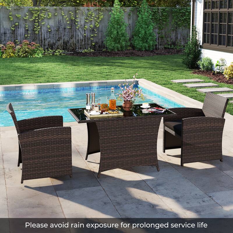 3 Piece Patio Wicker Dining Set with Glass Table and Cushioned Chairs - 25" x 23.5" x 31"