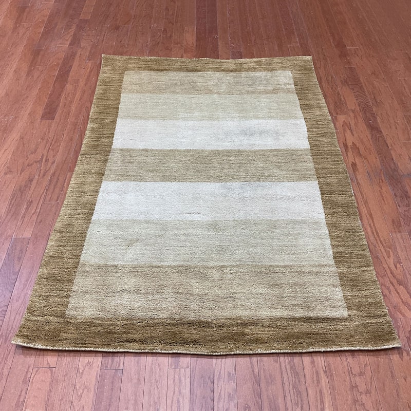 HERAT ORIENTAL Handmade 4' x 6' Dark Border Tibetan Wool Rug - 4' x 6' - Gold/Ivory