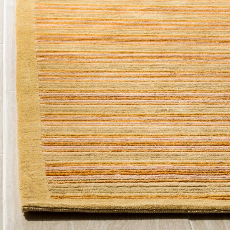 SAFAVIEH Couture Hand-knotted Tibetan Suhayla Modern Wool Rug