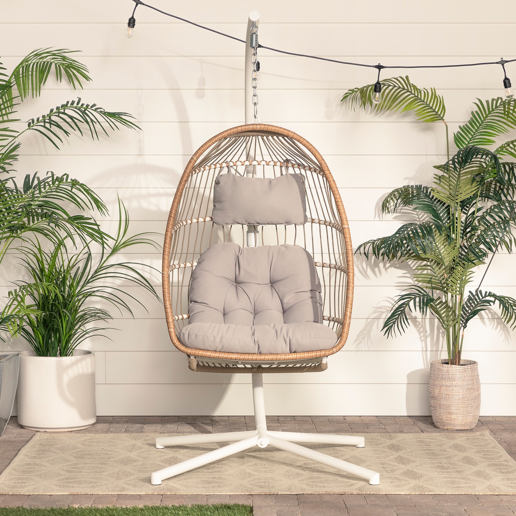 Outdoor swinging egg discount chair with stand