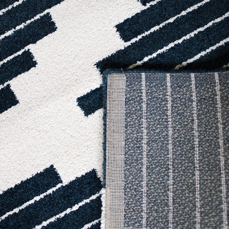 Carson Carrington Salsaker Geometric Area Rug