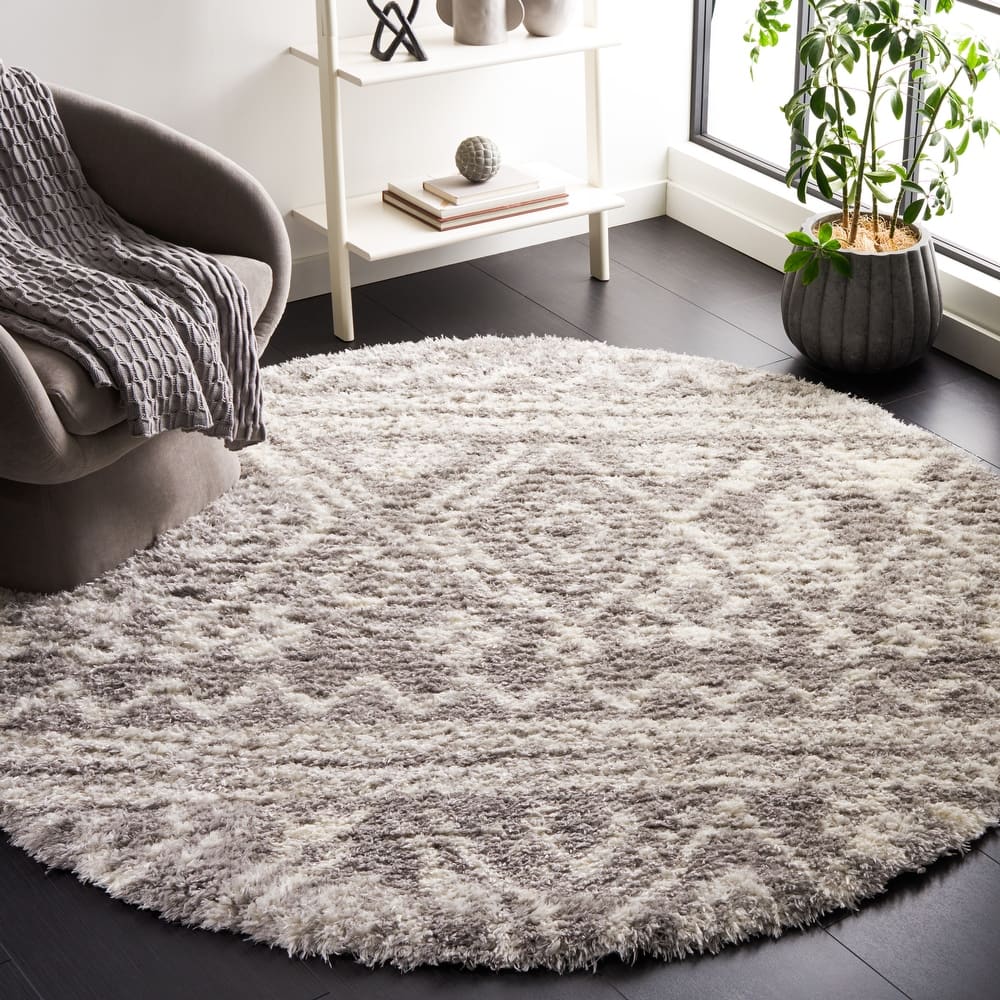 SAFAVIEH Handmade Flokati Yaffa Shag Solid Polyester Rug