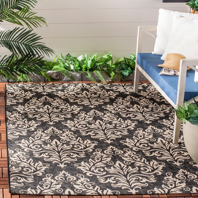 SAFAVIEH Courtyard Moshka Indoor/ Outdoor Waterproof Patio Backyard Rug - 5'3" x 7'7" - Black/Creme