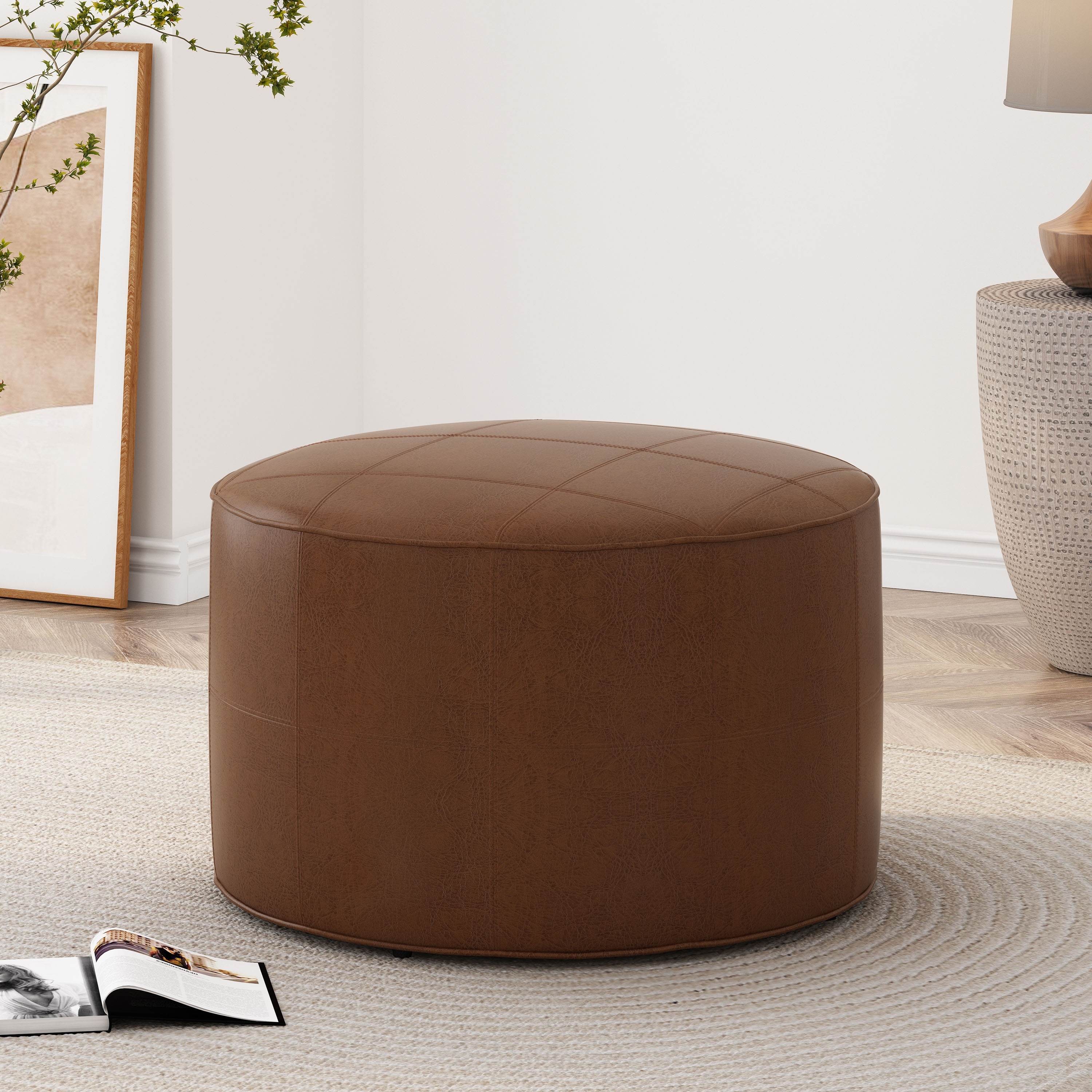 Round faux leather ottoman discount
