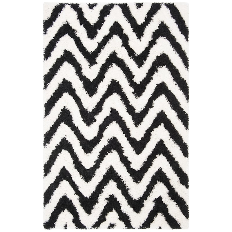 SAFAVIEH Handmade Kanesha Shag Karien Rug