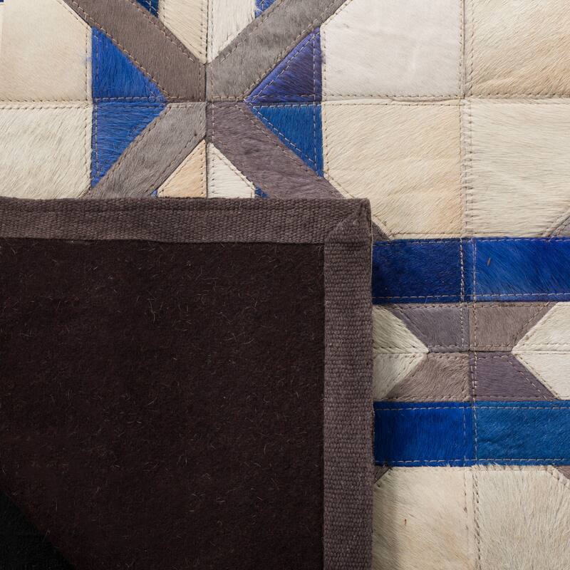 SAFAVIEH Handmade Studio Leather Annique Modern Leather Rug
