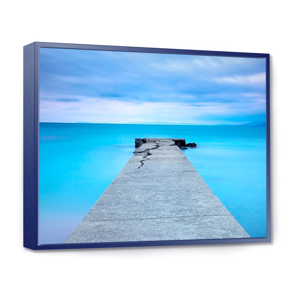 Designart "Broken Concrete Jetty" Seascape Framed Canvas Art Print