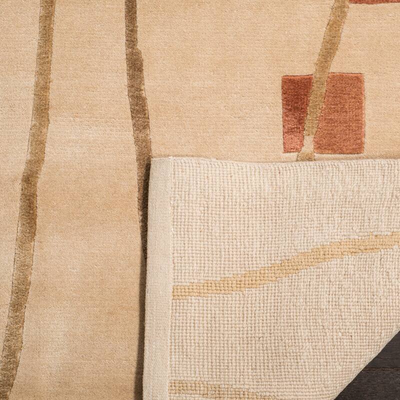 SAFAVIEH Couture Hand-knotted Tibetan Caris Modern Wool Rug