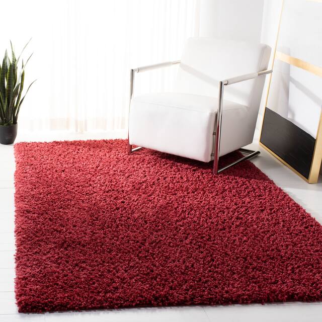 SAFAVIEH August Shag Veroana Solid 1.5-inch Thick Rug - 5'3" x 7'6" - Red