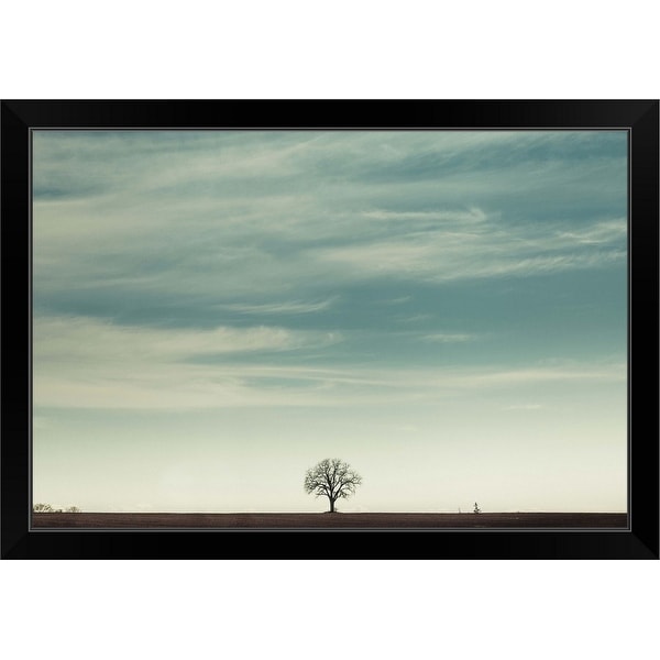"Single lonely tree on horizon of farmland" Black Framed Print