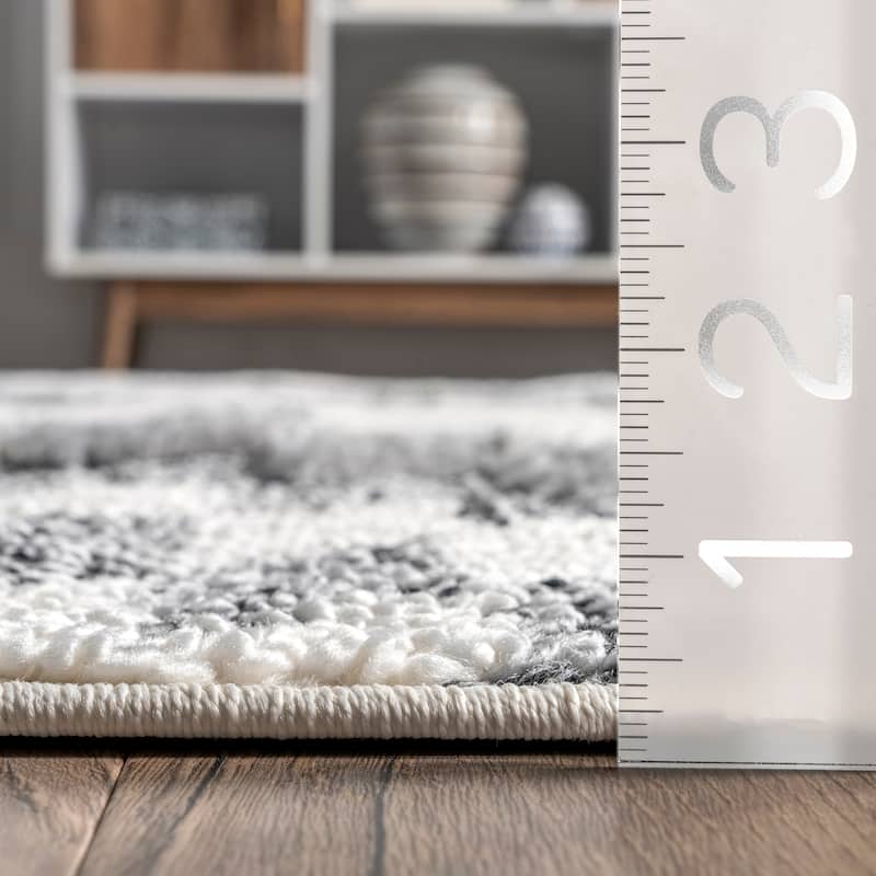 Nuloom Adelade Aztec High Low Shaggy Tassel Area Rug