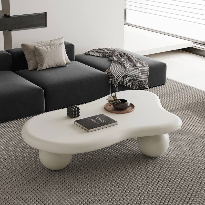 47 Inch Cloud Shaped Coffee Table with 3 Ball Legs