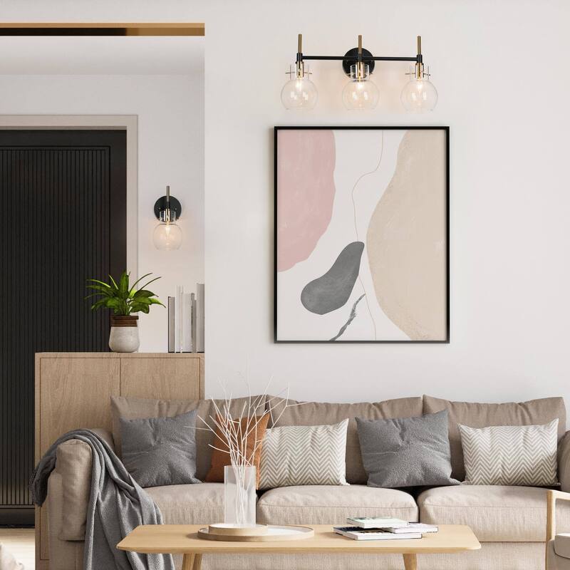 Isha Modern Black Gold 1-Light Bathroom Wall Sconce with Globe Glass - 5" L x 6" W x 10.5" H