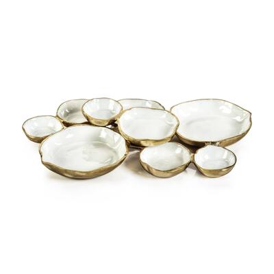Cluster of Nine Round Serving Bowls with White Enamel Interior