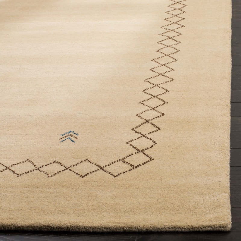 SAFAVIEH Handmade Himalaya Poppy Border Modern Hand-spun Wool Rug