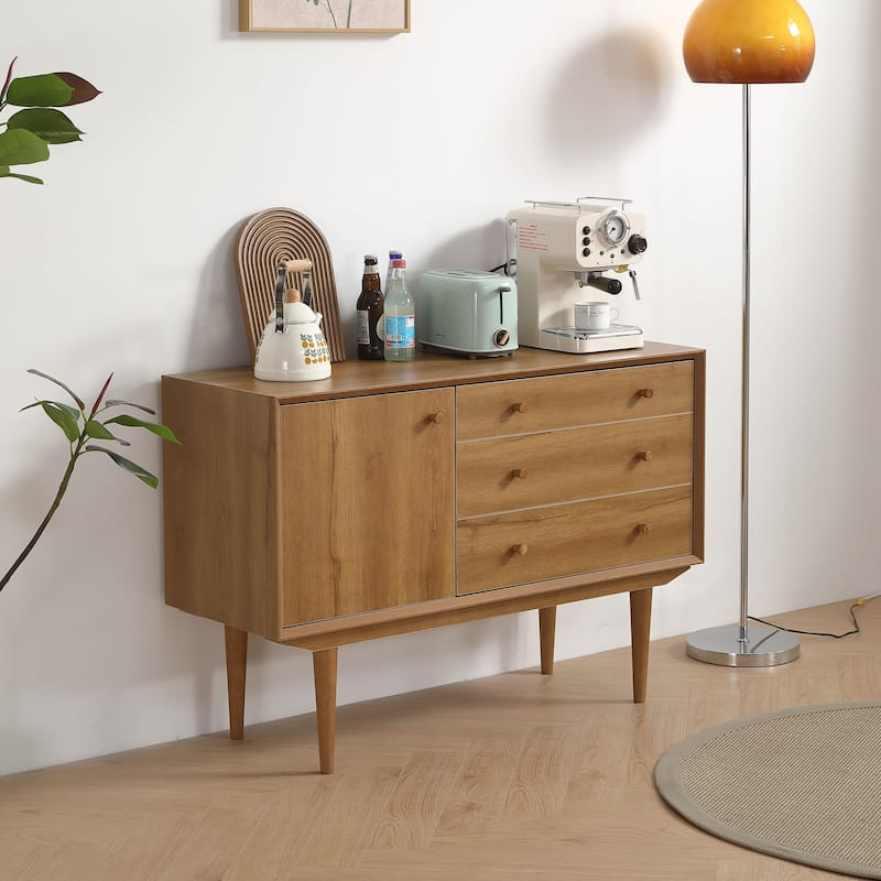 An antique buffet in oak color