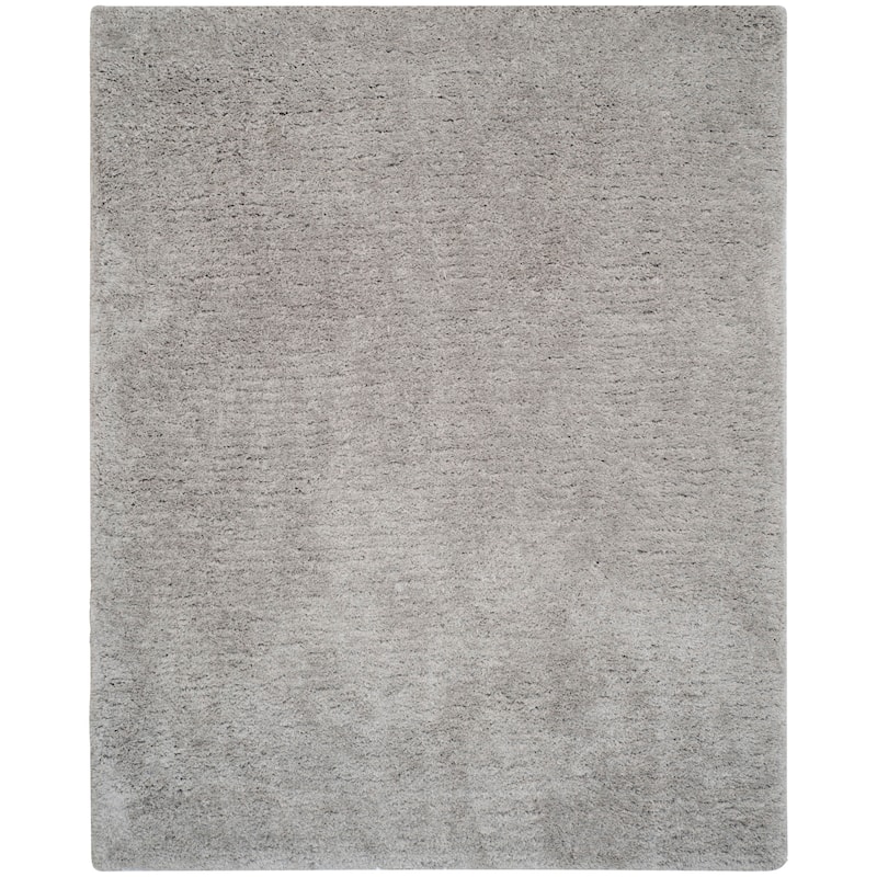 SAFAVIEH Handmade Ryann Shag Anneclaar Solid Polyester Rug