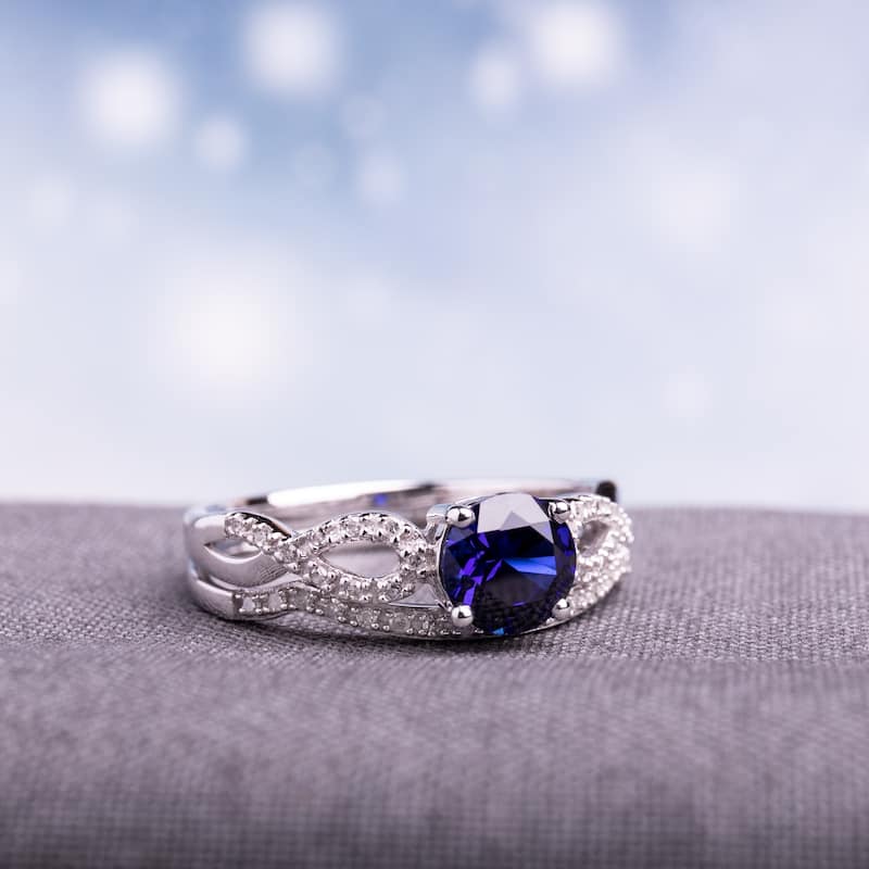 Miadora 10k White Gold Created Blue Sapphire and 1/6ct TDW Diamond Bridal Ring Set