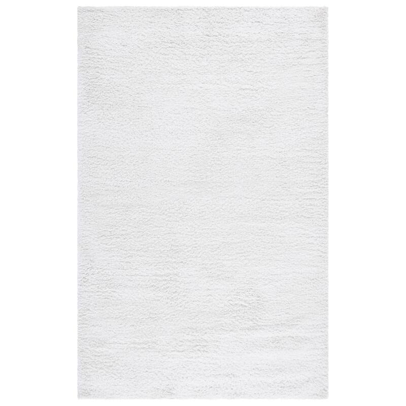 SAFAVIEH Handmade Sheep Shag Dochia Solid Polyester Rug - 4' x 6' - Ivory