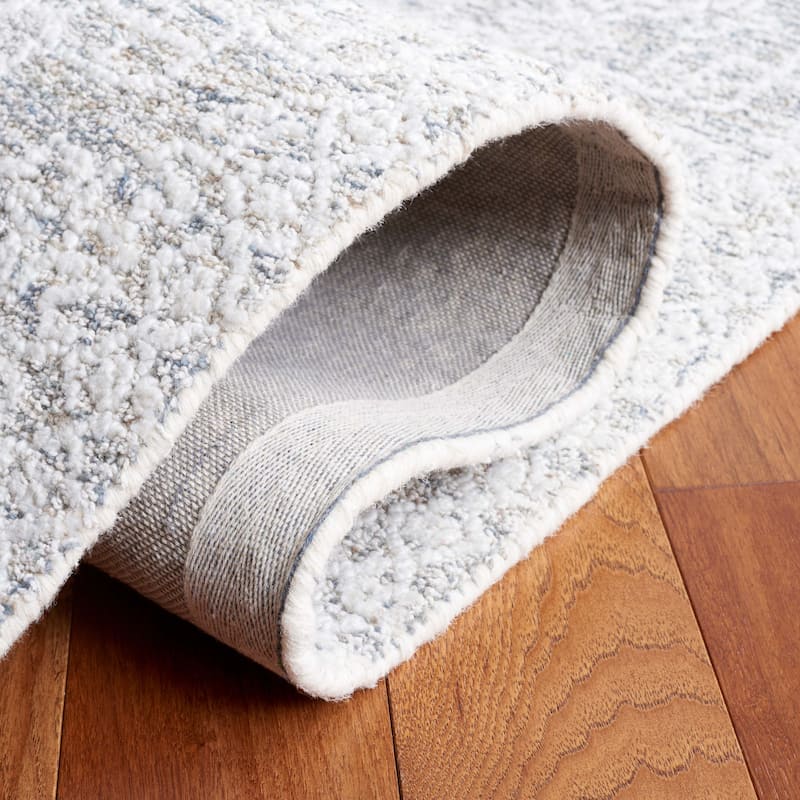 SAFAVIEH Handmade Ebony Alfonsa Modern Rug