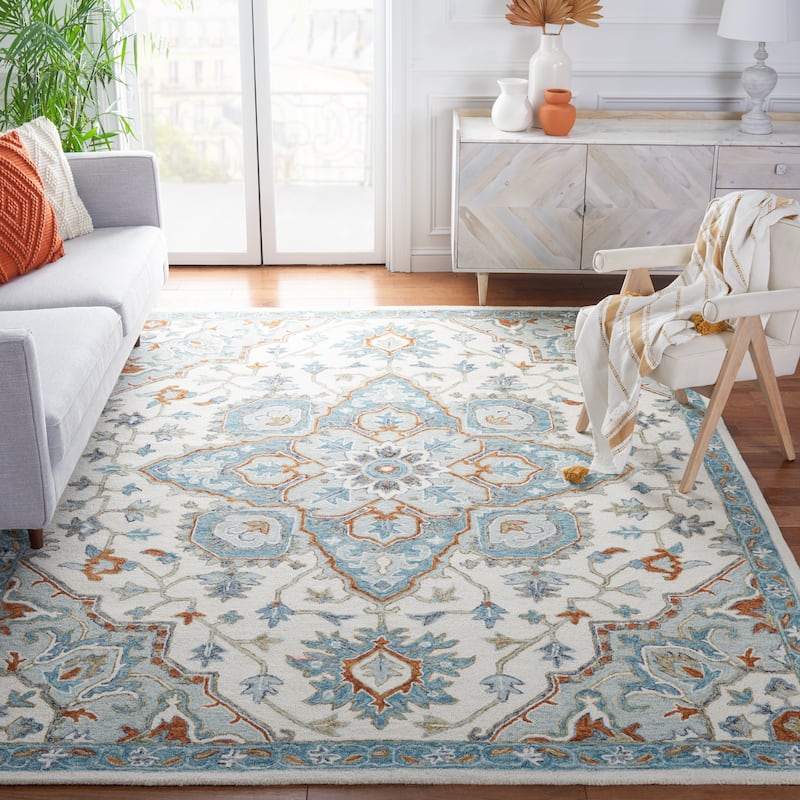 SAFAVIEH Handmade Heritage Marjanca Traditional Wool Rug - 9' x 12' - Ivory/Blue