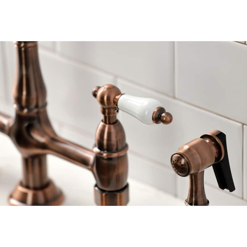 Kingston Brass Heritage Bridge Kitchen Faucet with Brass Sprayer