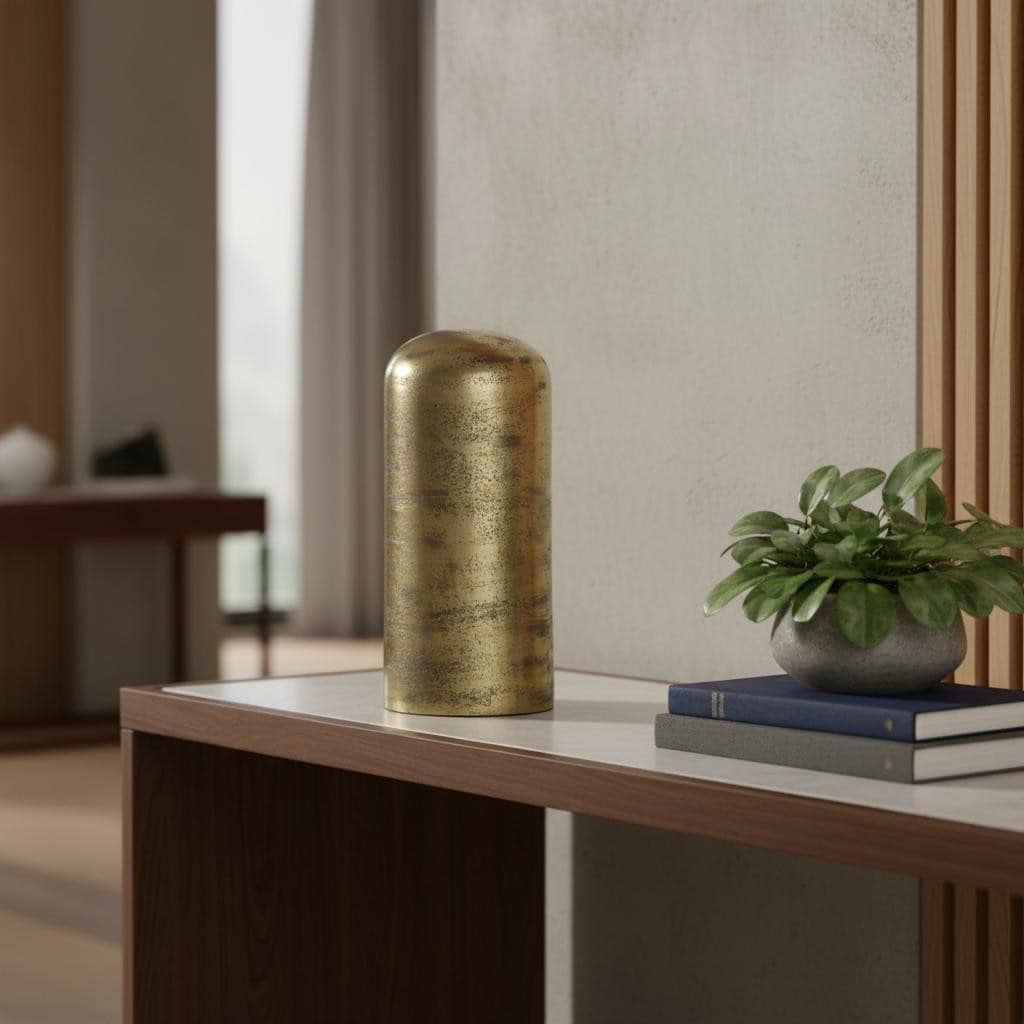 HomeRoots 10" Antiqued Brass Cast Aluminum Cylindrical Tabletop Sculpture - 5.00 in. x 10.25 in. x 5.00 in.