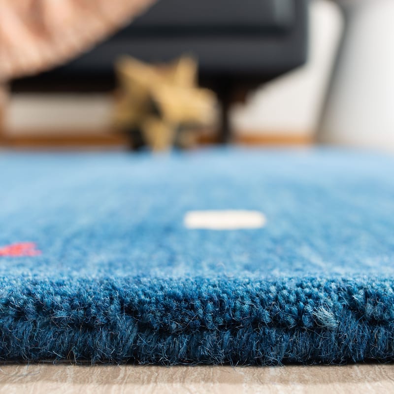SAFAVIEH Handmade Himalaya Breann Border Wool Rug