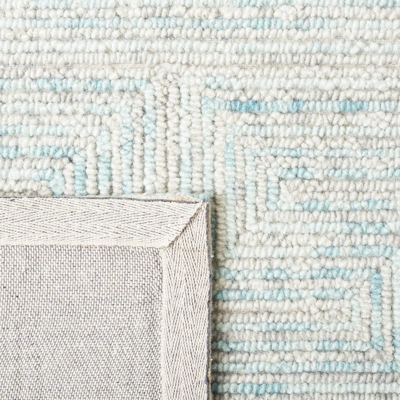 SAFAVIEH Handmade Ikat Jurina Wool Rug