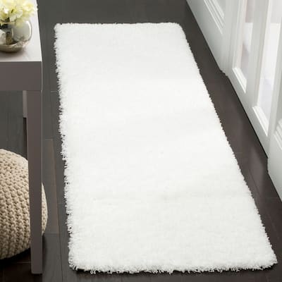 SAFAVIEH Laguna Shag Verdiana Solid Color 2-inch Thick Rug.