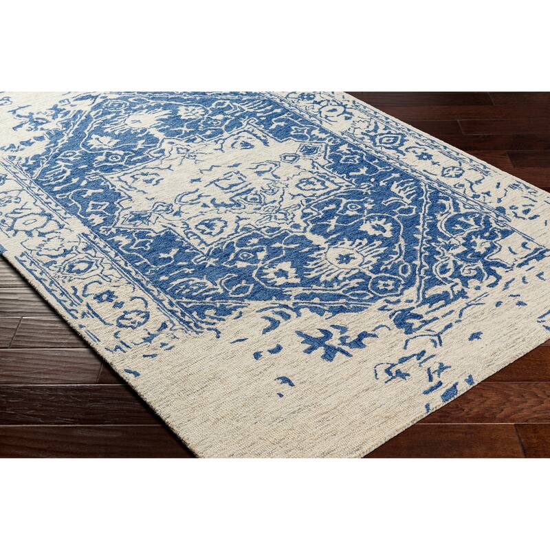 Felecia Handmade Distressed Medallion Wool Area Rug