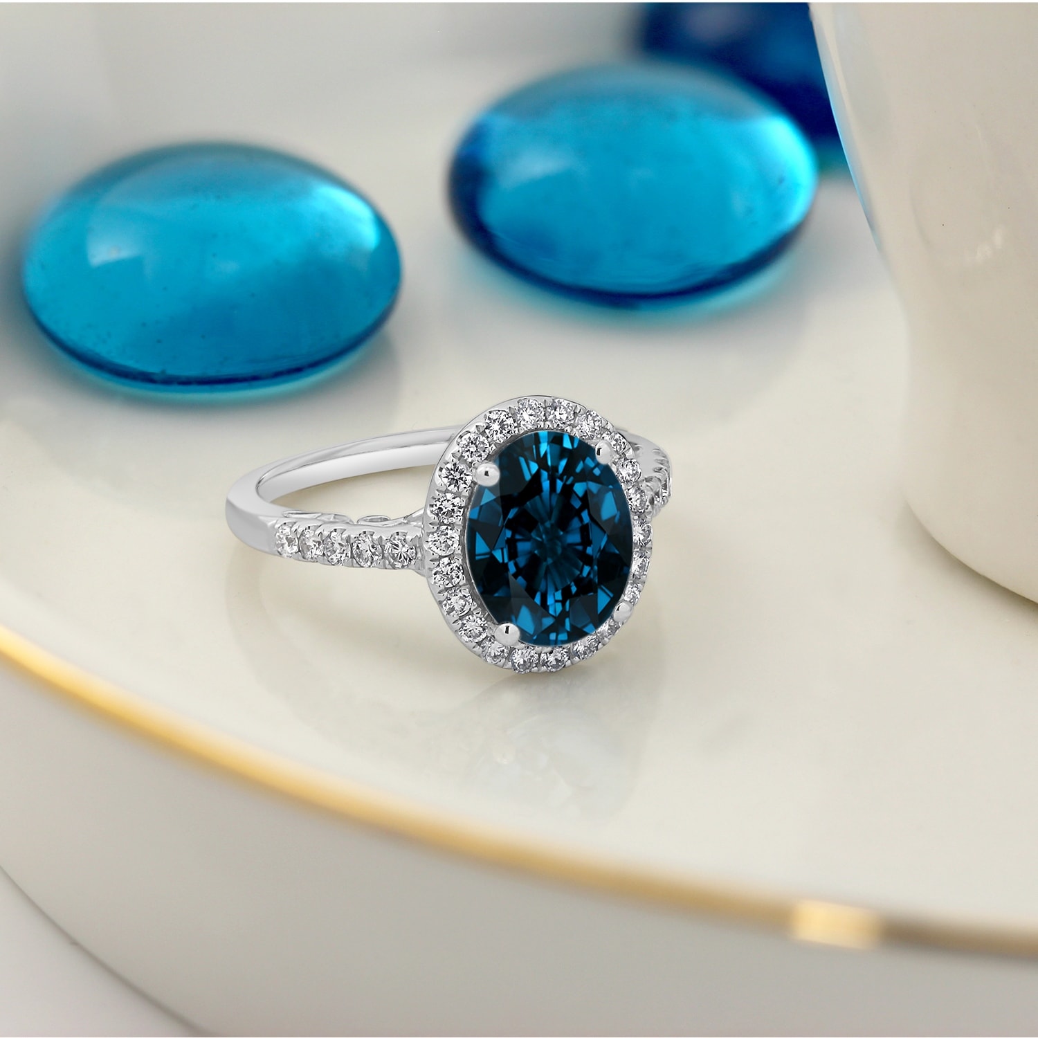 Oval blue topaz and diamond ring cuwl standard license