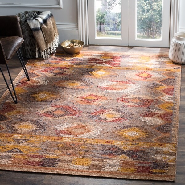 SAFAVIEH Handmade Canyon Laurine Boho Tribal Wool Rug. Opens flyout.
