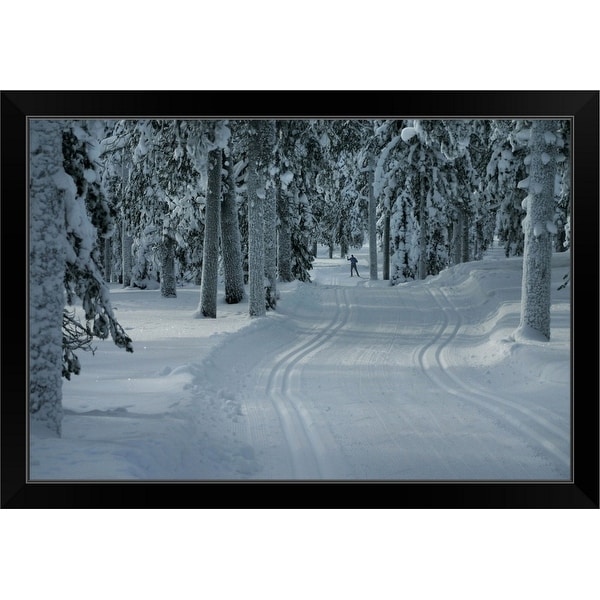 "Cross country skier on a forest snow trail" Black Framed Print