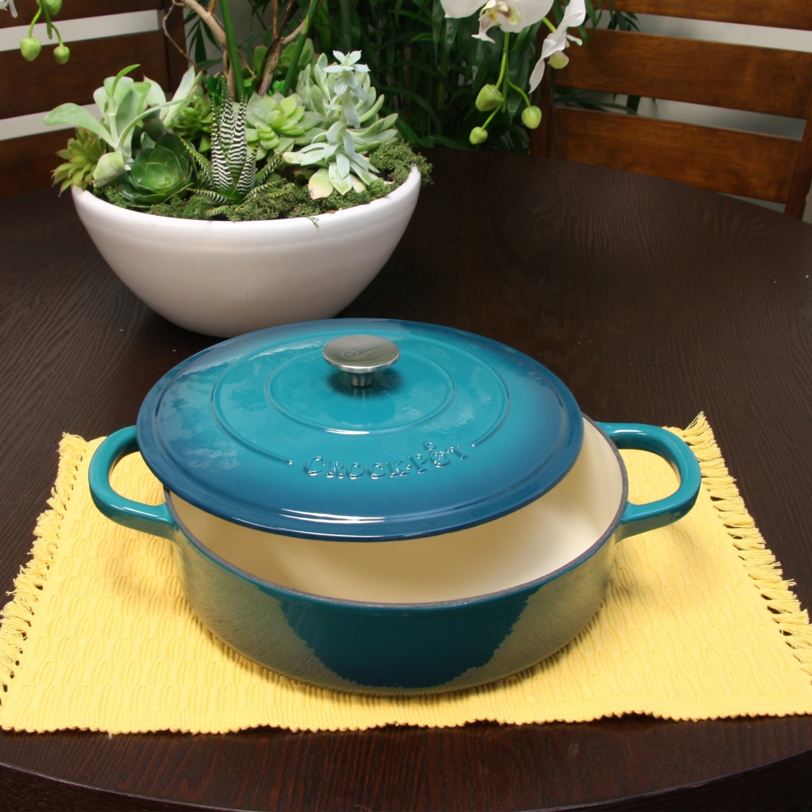 https://ak1.ostkcdn.com/images/products/is/images/direct/5ebadef6dfda82782ff53a7b0fb65a6875aba29f/5-Quart-Round-Enameled-Cast-Iron-Braising-Pan-W-Lid-in-Turquoise-Ombre.jpg