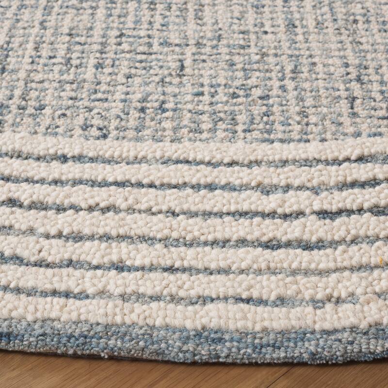 SAFAVIEH Handmade Ebony Dorith Border Wool Rug