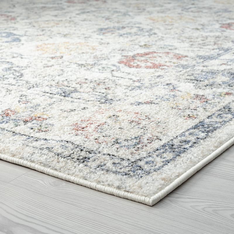 Addalyn Oriental Border Area Rug