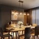 preview thumbnail 2 of 17, Diore Modern Gold 5-Light Crystal Chandelier 40 in. W Linear Glam Island Lights for Kitchen Island - L 40.2" x H 70" Max