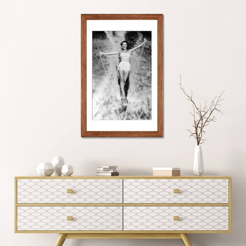 iCanvas "1950s Smiling Woman In White Two Piece Bathing Suit Aquaplaning Water Skiing Looking At Camera" by Vintage Images