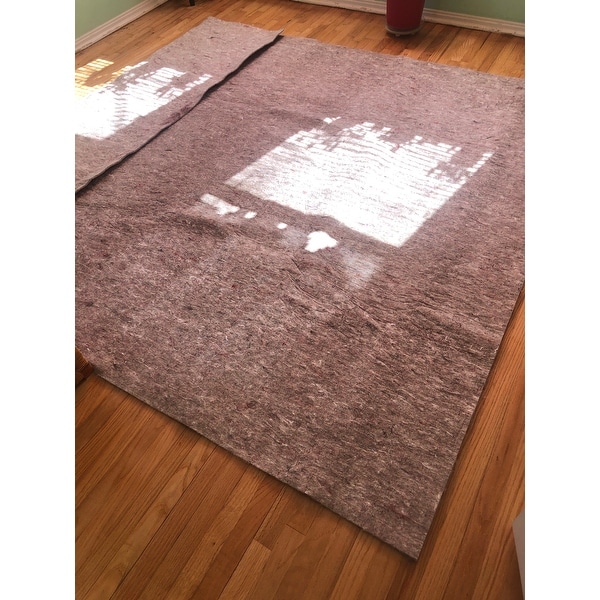 https://ak1.ostkcdn.com/images/products/is/images/direct/5efb97f112c473a4c17b7e8c1b72264ca54ace26/Mohawk-Home-Felt-Rug-Pad-14-Inch-Thick-Plush-Comfort-Cushion--Grey.jpeg