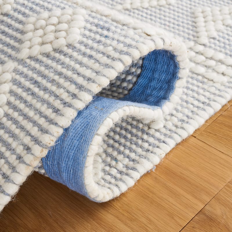 SAFAVIEH Handmade Natura Miradie Wool Braided Tassel Rug