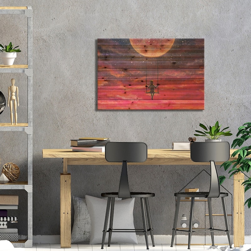 Girl Guy Rides On Swing In Sky Against Starry Sky. Print On Wood by Valery Rybakow - Multi-Color