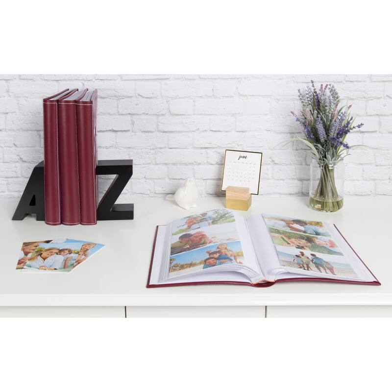 DesignOvation Debossed Black Faux Leather Photo Album (Pack of 4)
