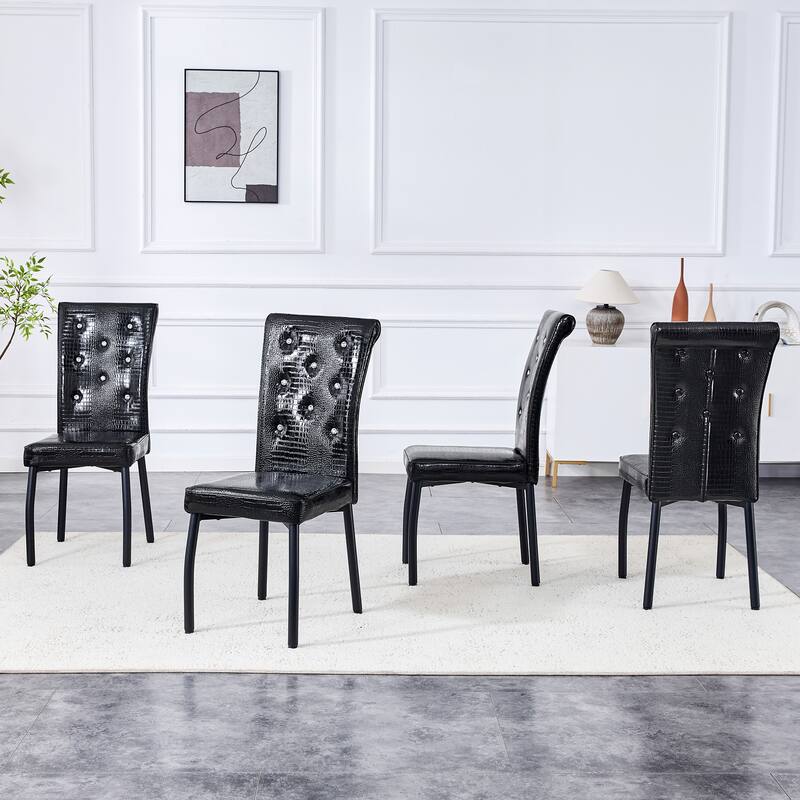 A set of 4 white and black vintage crocodile leather cushioned dining chairs, featuring crystal clasp design and leather