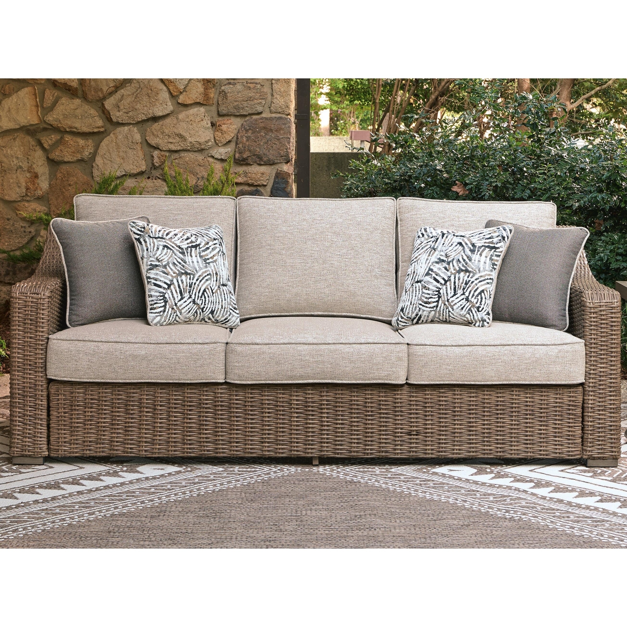 Signature Design by Ashley Carmel Bay Beige/Gray Outdoor Sofa