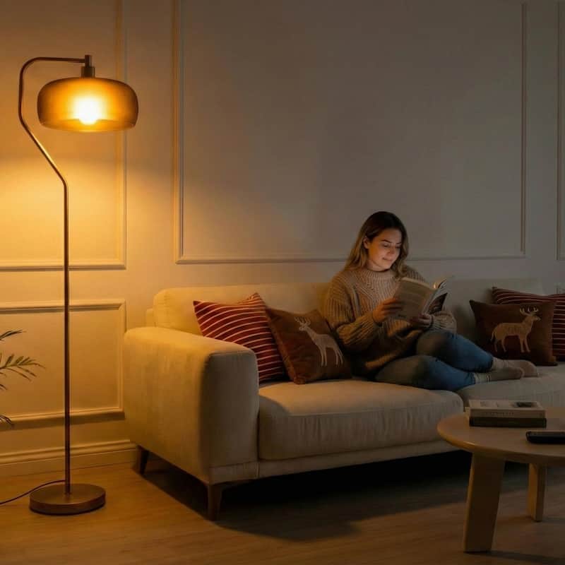 Tute Modern Floor Lamp with Curved Gold Base and Black Drum Shade