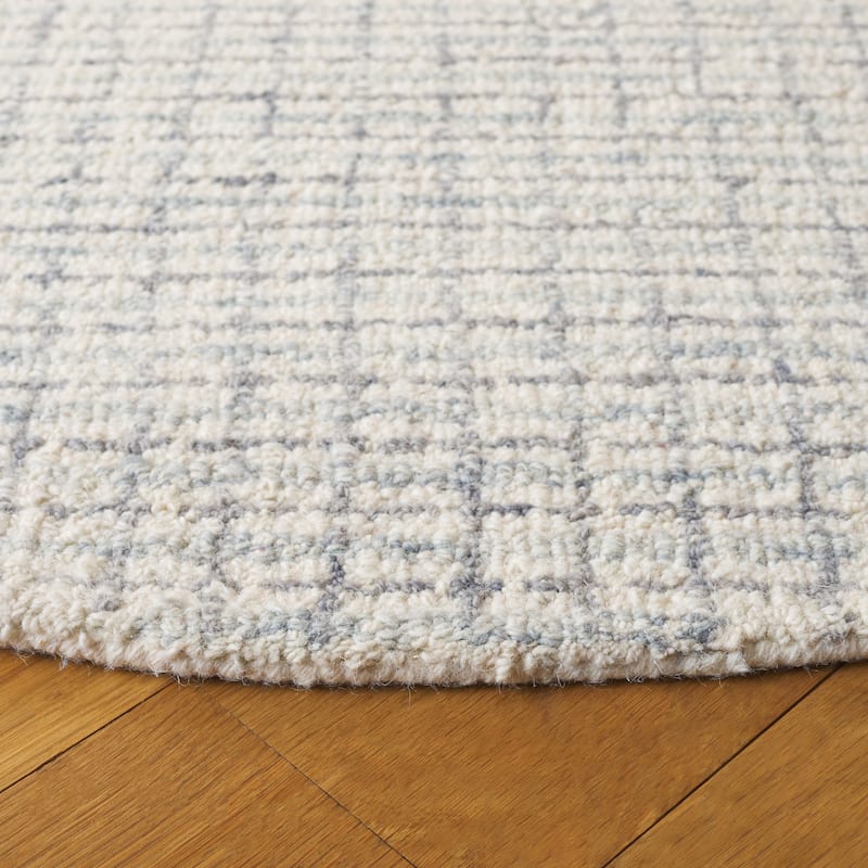 SAFAVIEH Handmade Ebony Midori Modern & Contemporary Wool Rug