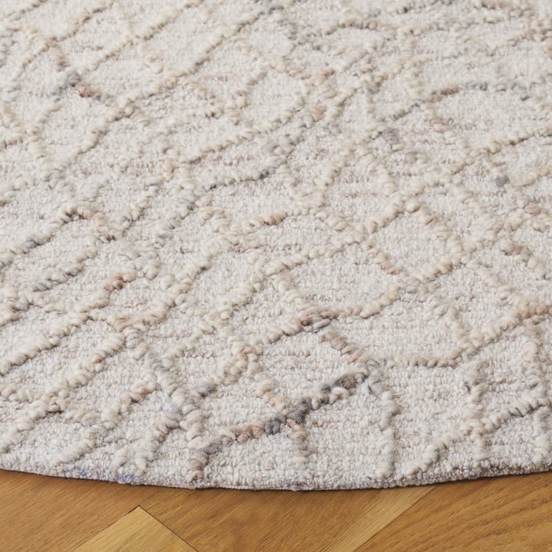 SAFAVIEH Handmade Ebony Teisuke Wool Rug